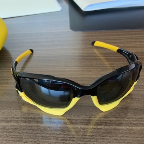 black and yellow oakleys